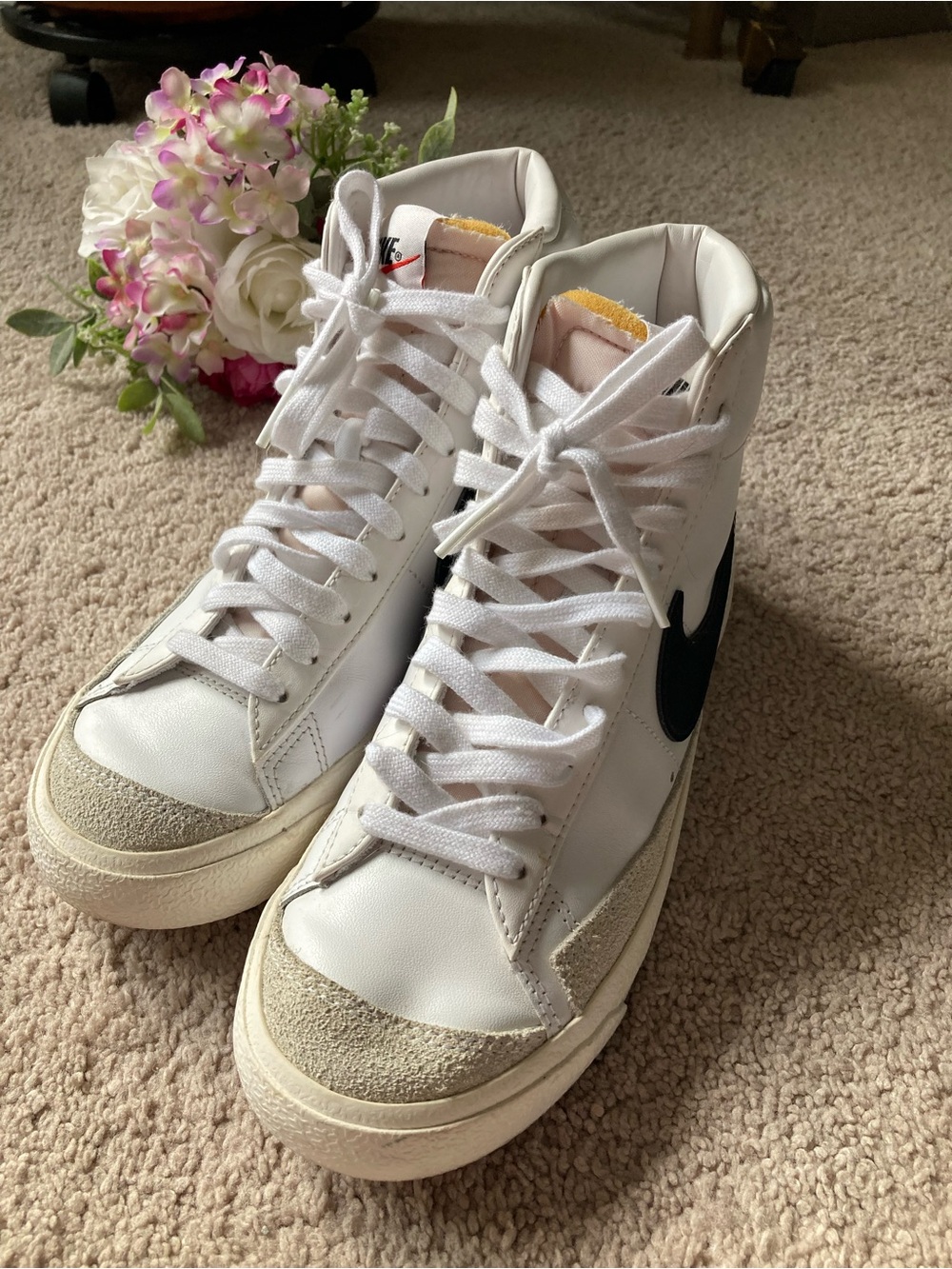 Nike Women’s White High-Top Sneakers with Black Swoosh